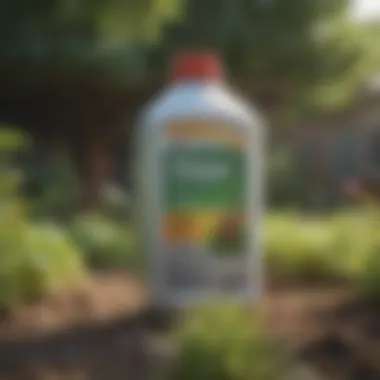 Close-up of Roundup herbicide container against a garden backdrop